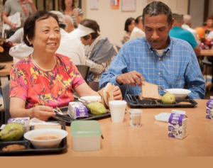 serving seniors; adults eating