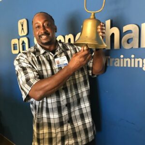 Second Chance, black man ringing bell of success