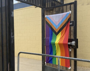 Outside gate with Trans Flag