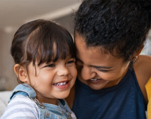 mother and smiling child_center for community solutions