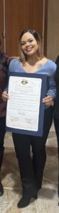 Simone Van Horne holding LCSW certificate